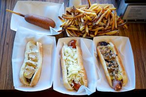 Gourmet_hot_dogs,_corn_dog_and_home_fries